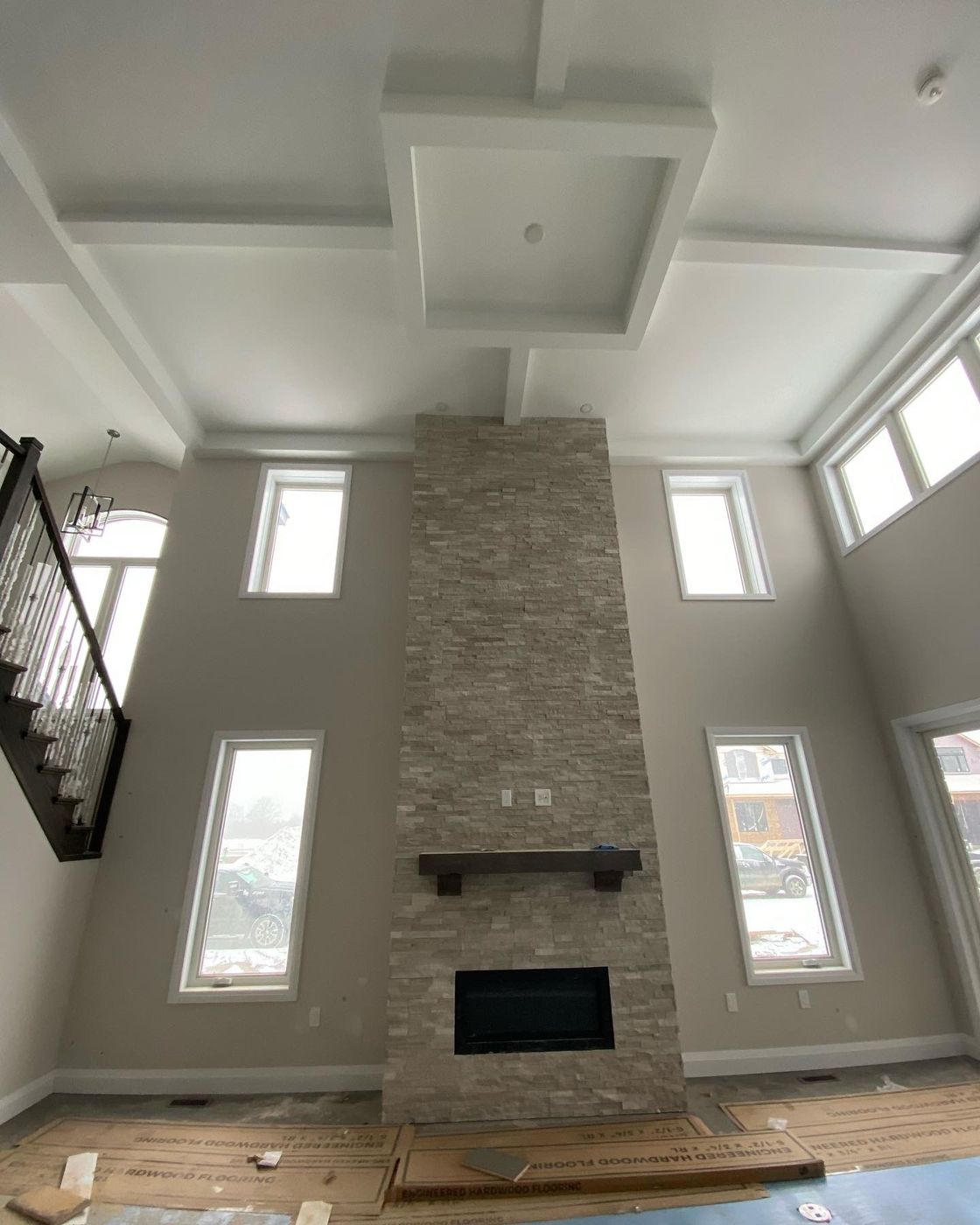 Estate — coffered ceiling and fireplace wall